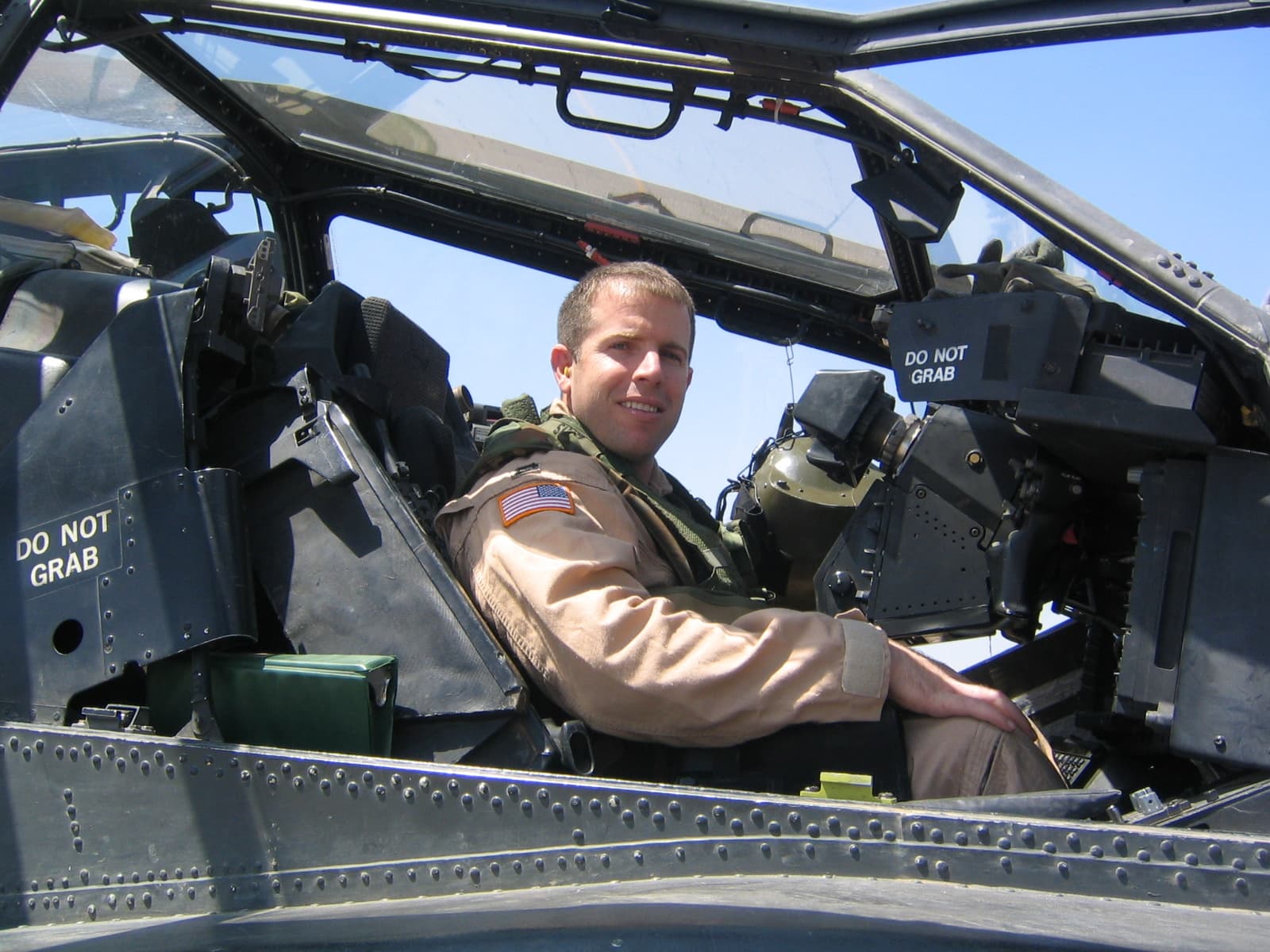 Mark Zais in the cockpit of an AH-64D Apache Longbow